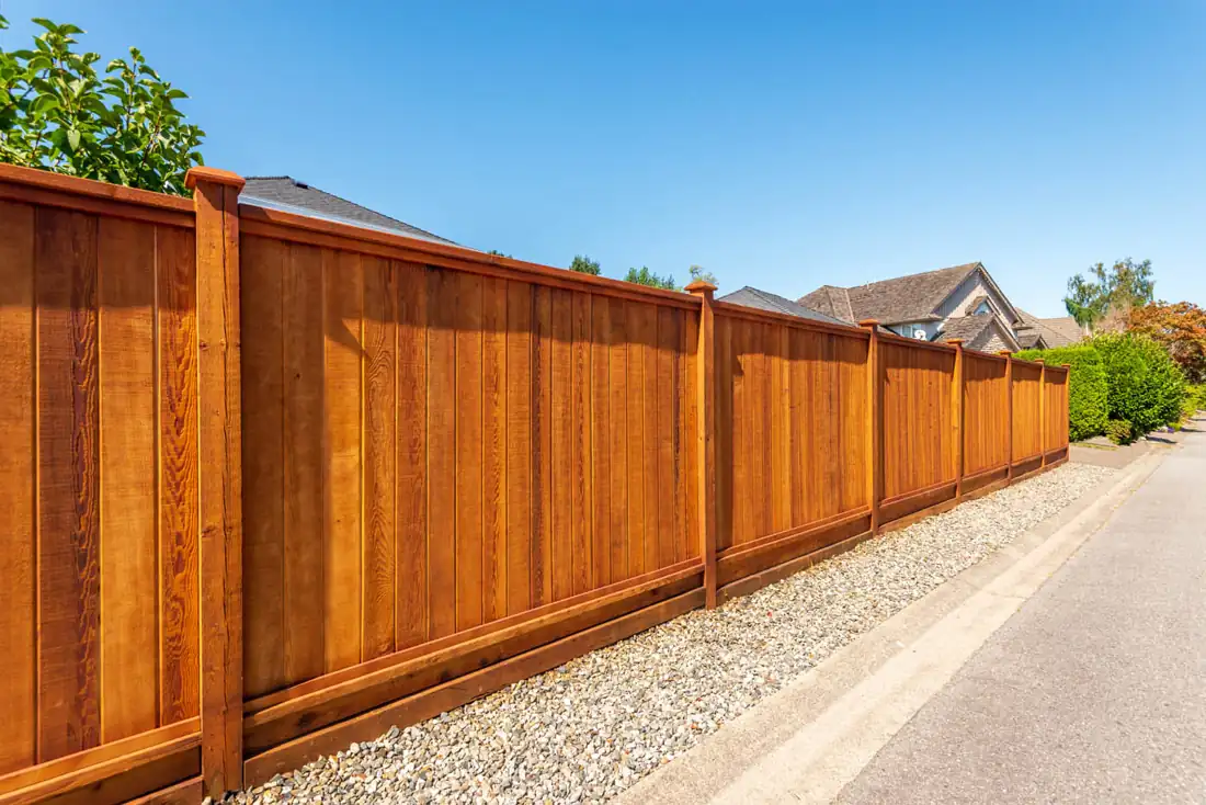 Stained wood privacy fence
